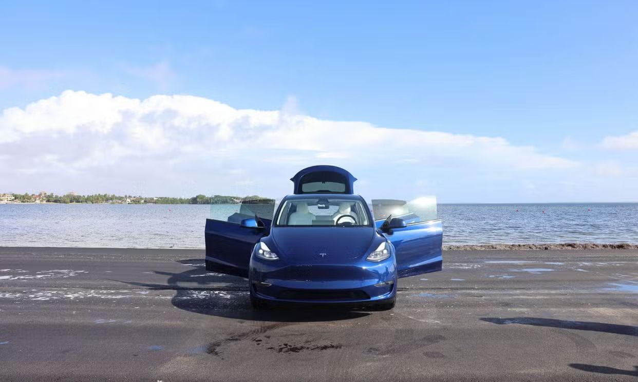 Tesla Model Y in Deep Blue Metallic for rent in Miami